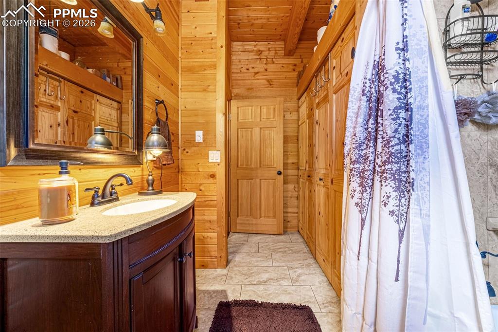 325 Willow Road Divide, CO 80814 - Photo 14 of 45 a bathroom with a sink and a mirror