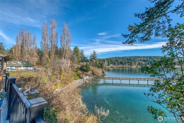 a view of a lake with a yard