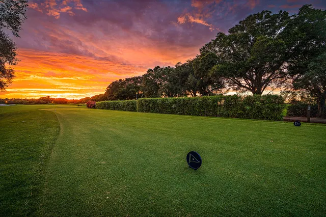 a view of a field with an outdoor space