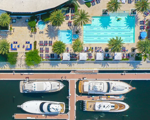 a kitchen with a stove and potted plants