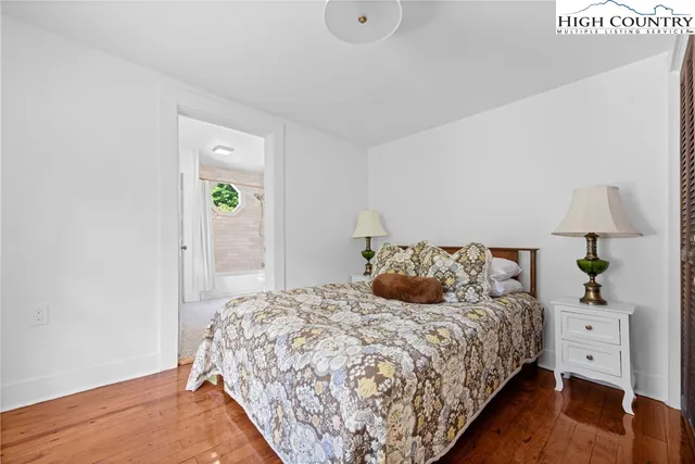 a bathroom with a toilet a sink and bathtub