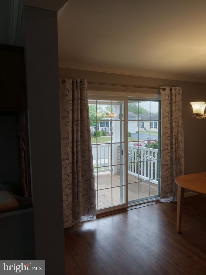 150 Random Road Douglassville, PA 19518 - Photo 13 of 32 wooden floor in an empty room with a window