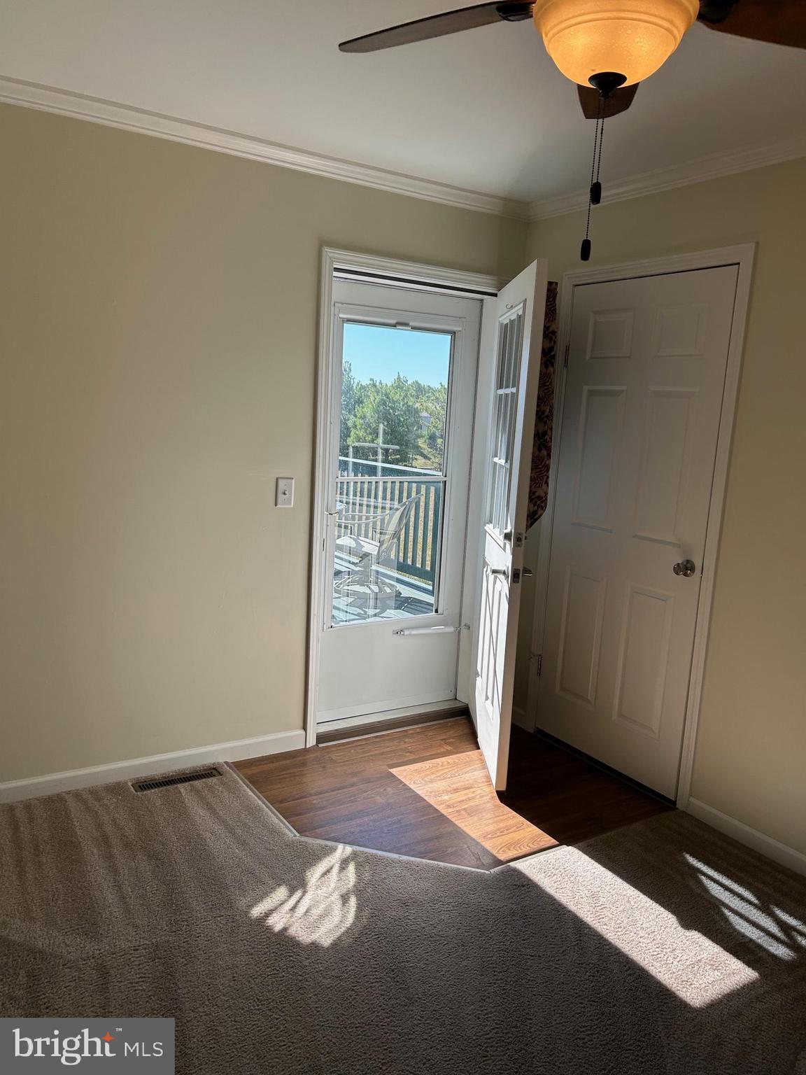 150 Random Road Douglassville, PA 19518 - Photo 20 of 32 a view of empty room with wooden floor and fan