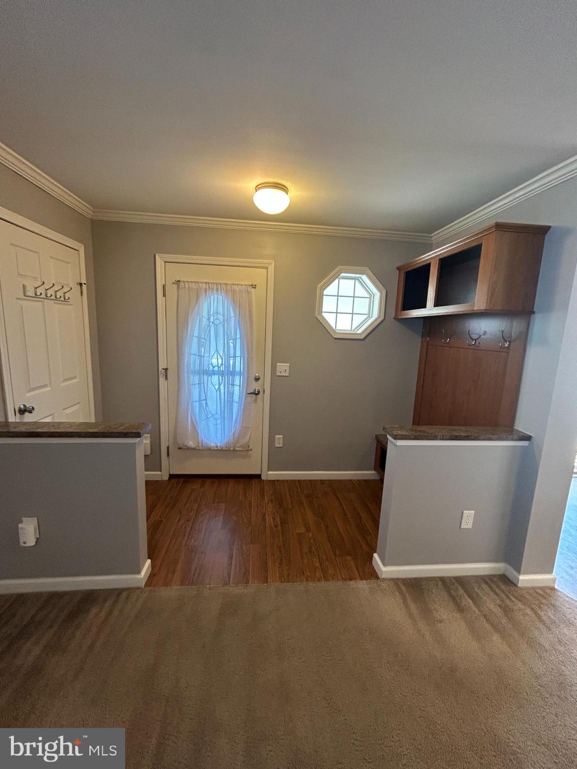 150 Random Road Douglassville, PA 19518 - Photo 8 of 32 an empty room with wooden floor and windows