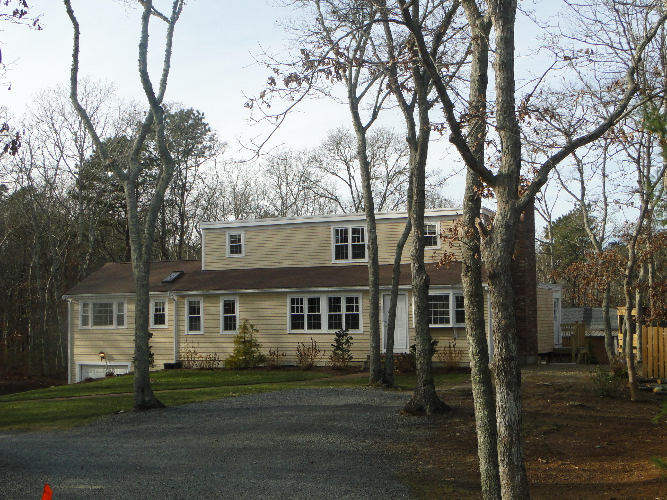 10 Bayview Road East Sandwich, MA 02537 - Photo 2 of 19 a front view of a house with a garden