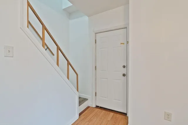a view of a hallway with staircase
