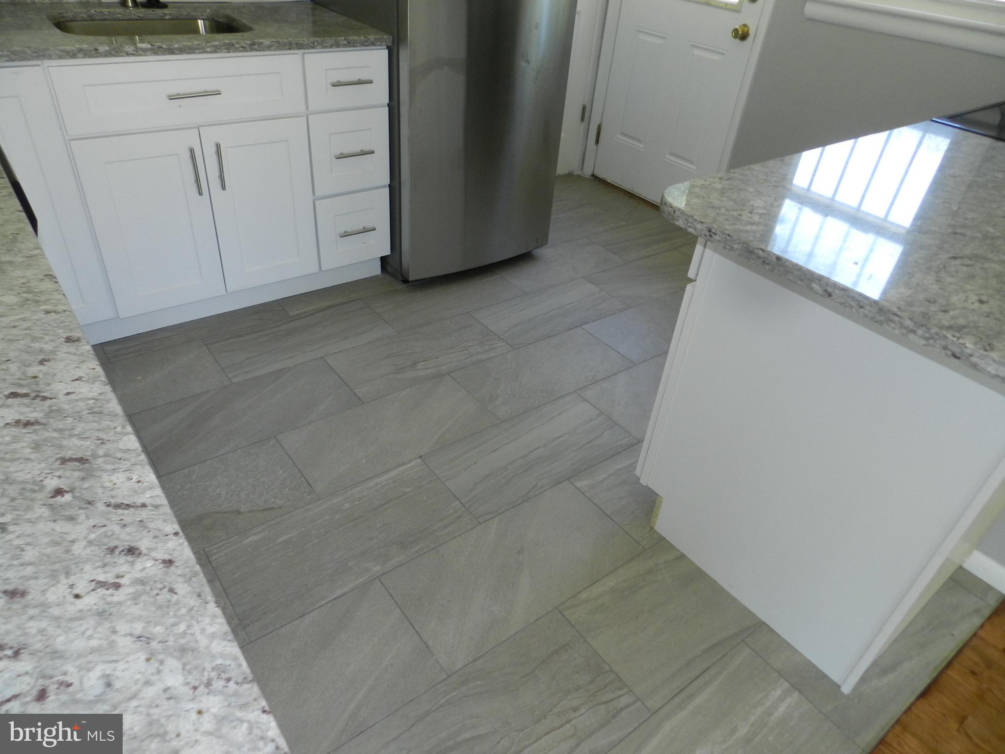 3902 92nd Avenue Springdale, MD 20706 - Photo 7 of 16 Flooring in kitchen