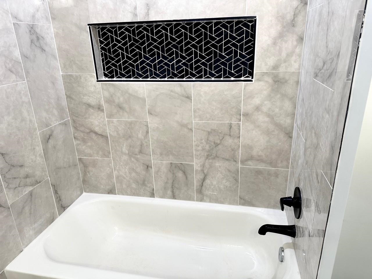 853 Hanley Street Memphis, TN 38114 - Photo 11 of 12 Full bathroom featuring shower / bathtub combination