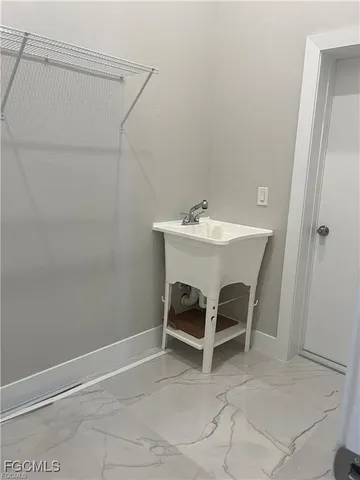 a workspace with furniture and a window