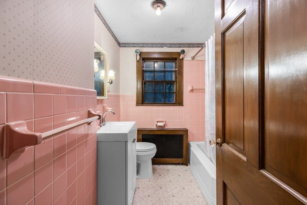 19 Forest Road Wakefield, MA 01880 - Photo 14 of 30 a bathroom with a sink and a mirror