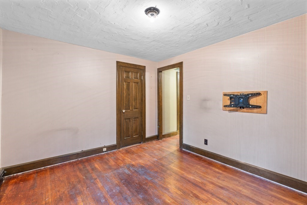 19 Forest Road Wakefield, MA 01880 - Photo 17 of 30 a view of a room with wooden floor
