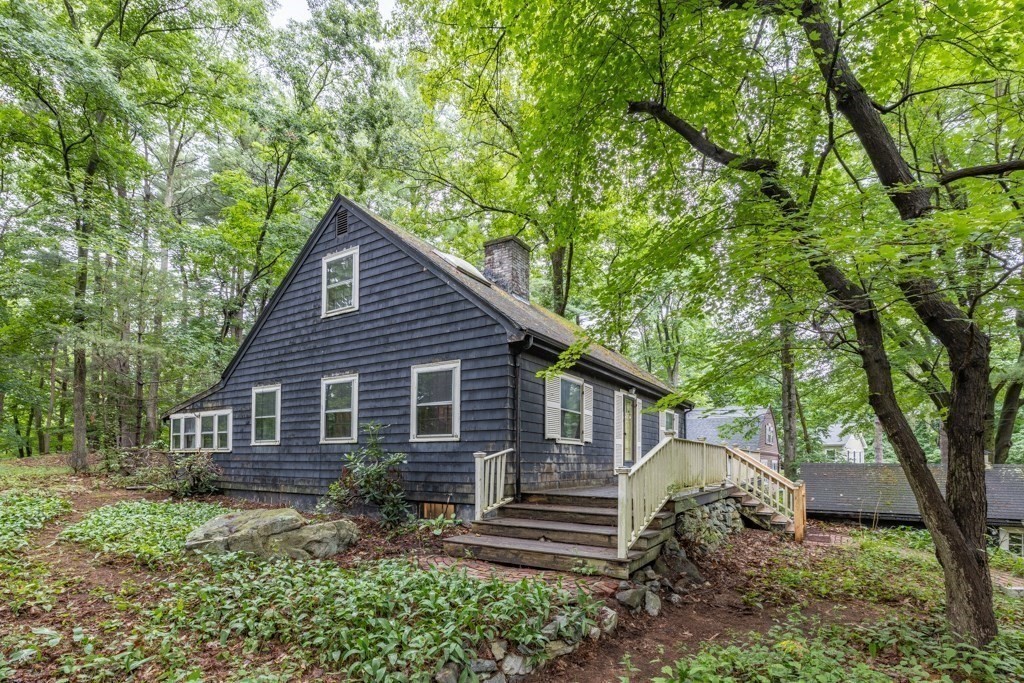 19 Forest Road Wakefield, MA 01880 - Photo 2 of 30 a front view of a house with a garden