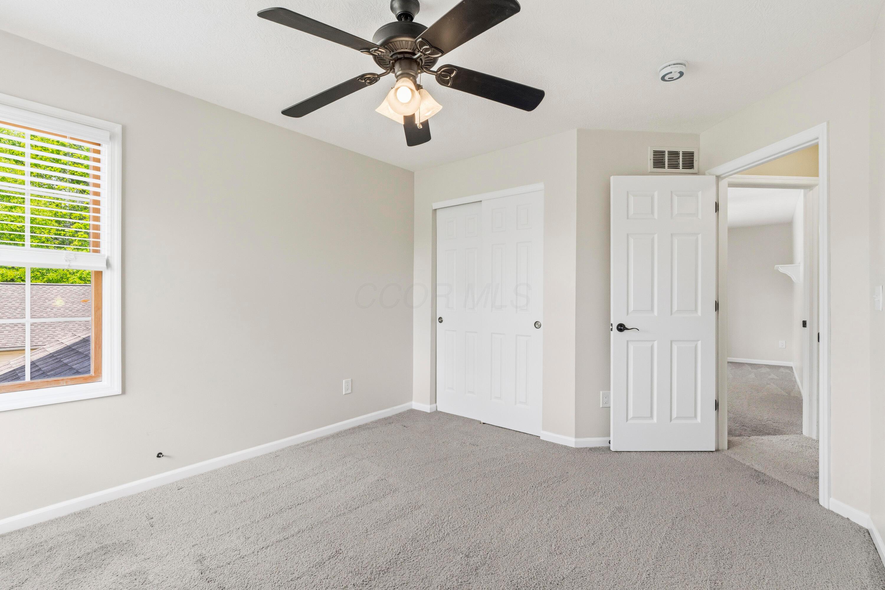 8507 Benner Road Johnstown, OH 43031 - Photo 42 of 69 Large Bedroom #4 with ceiling fan and NEW Carpet!