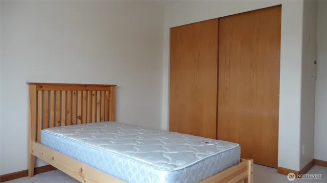 a view of a room with a large window