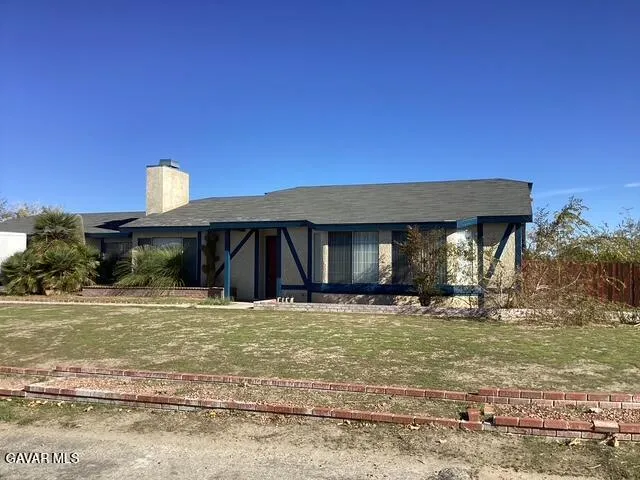 a house view with a outdoor space