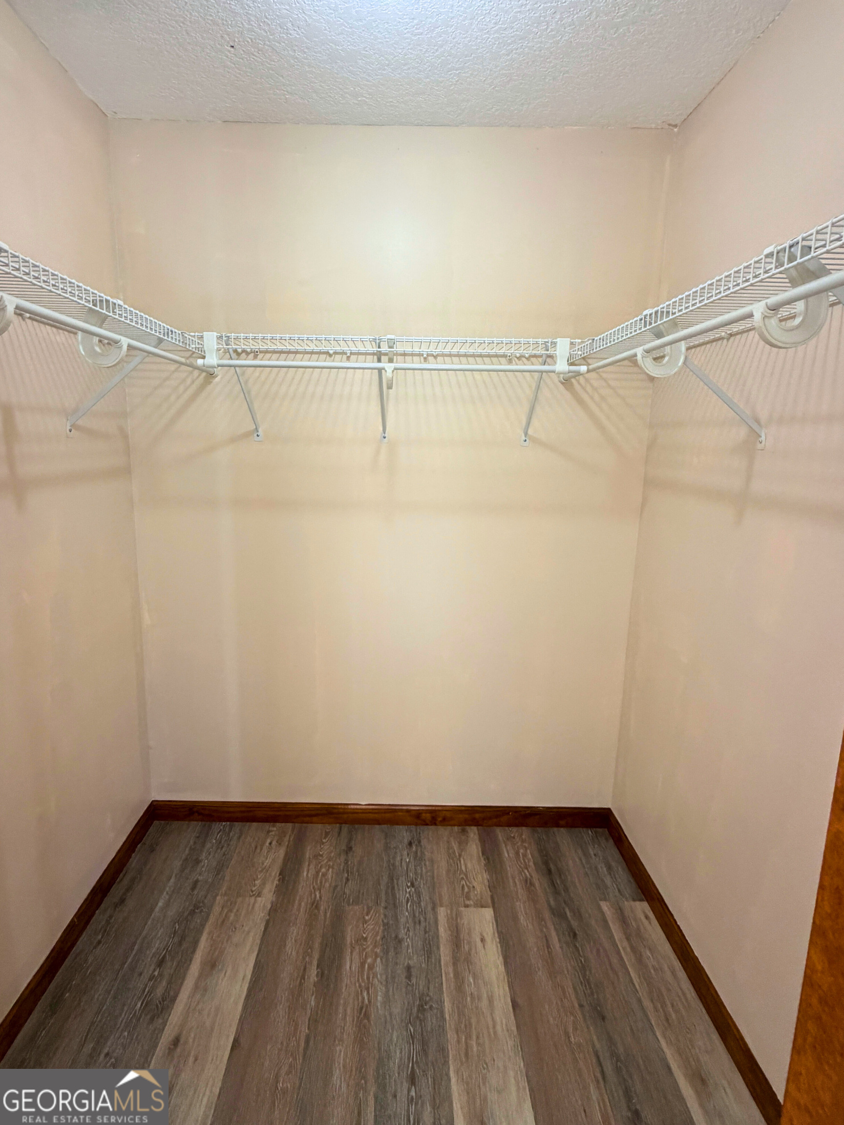 1818 Union Carbide Road Woodbine, GA 31569 - Photo 19 of 33 a view of a room with wooden floor