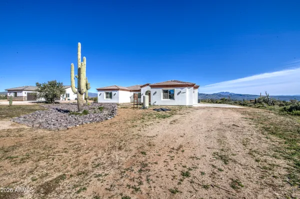 a house view with a yard