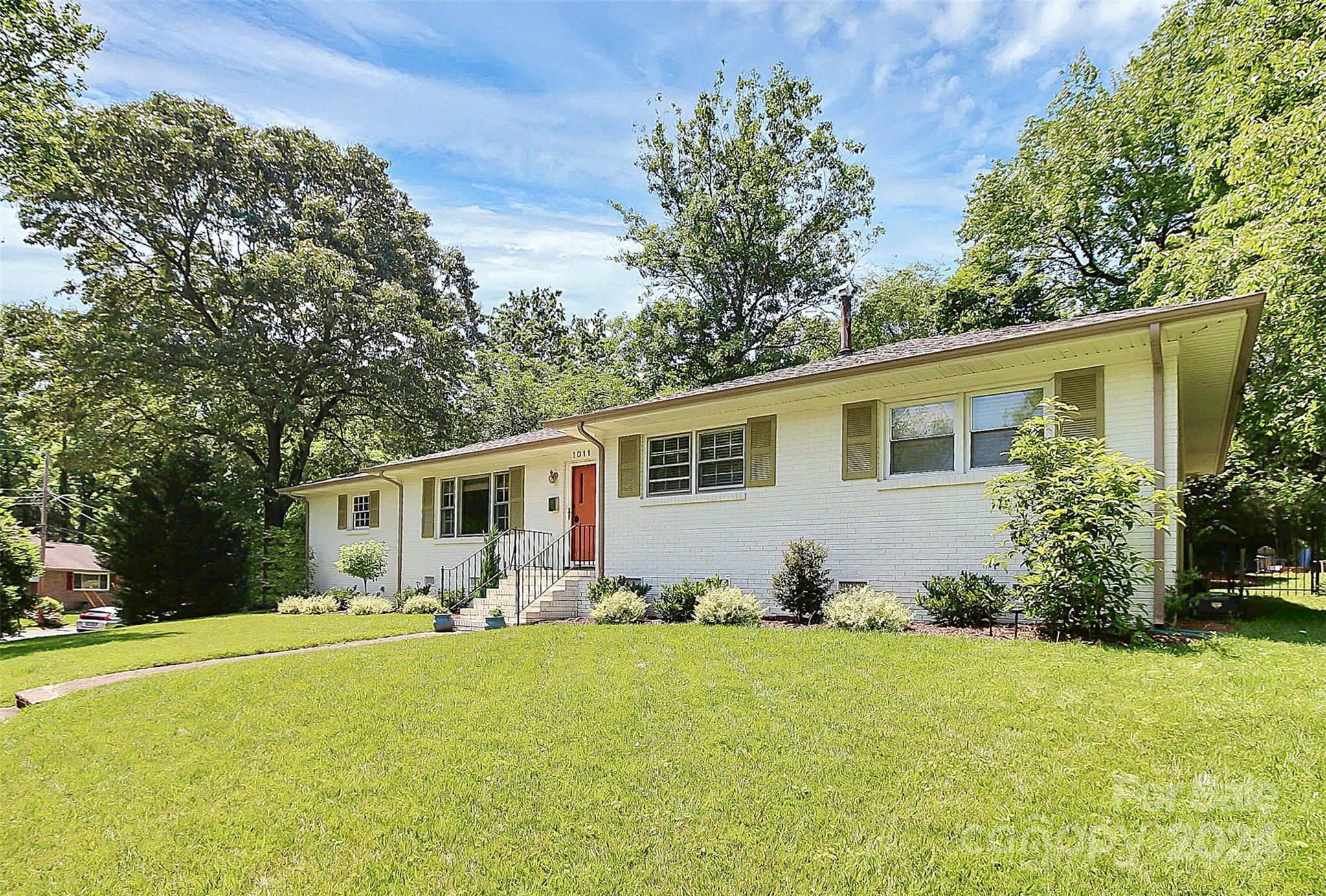 1011 Nancy Drive Charlotte, NC 28211 - Photo 2 of 44 a view of a house with backyard and sitting area