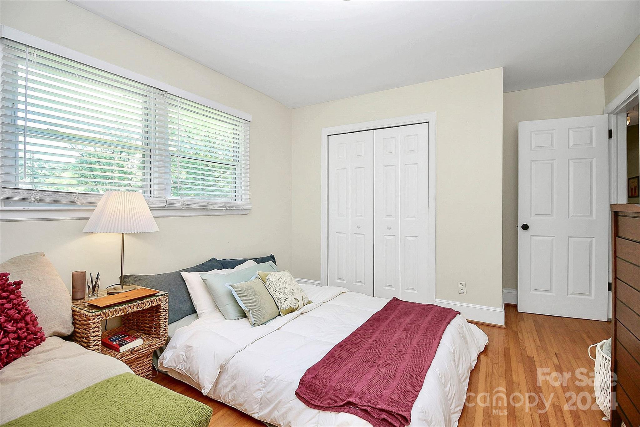1011 Nancy Drive Charlotte, NC 28211 - Photo 33 of 44 a bedroom with a bed and a lamp