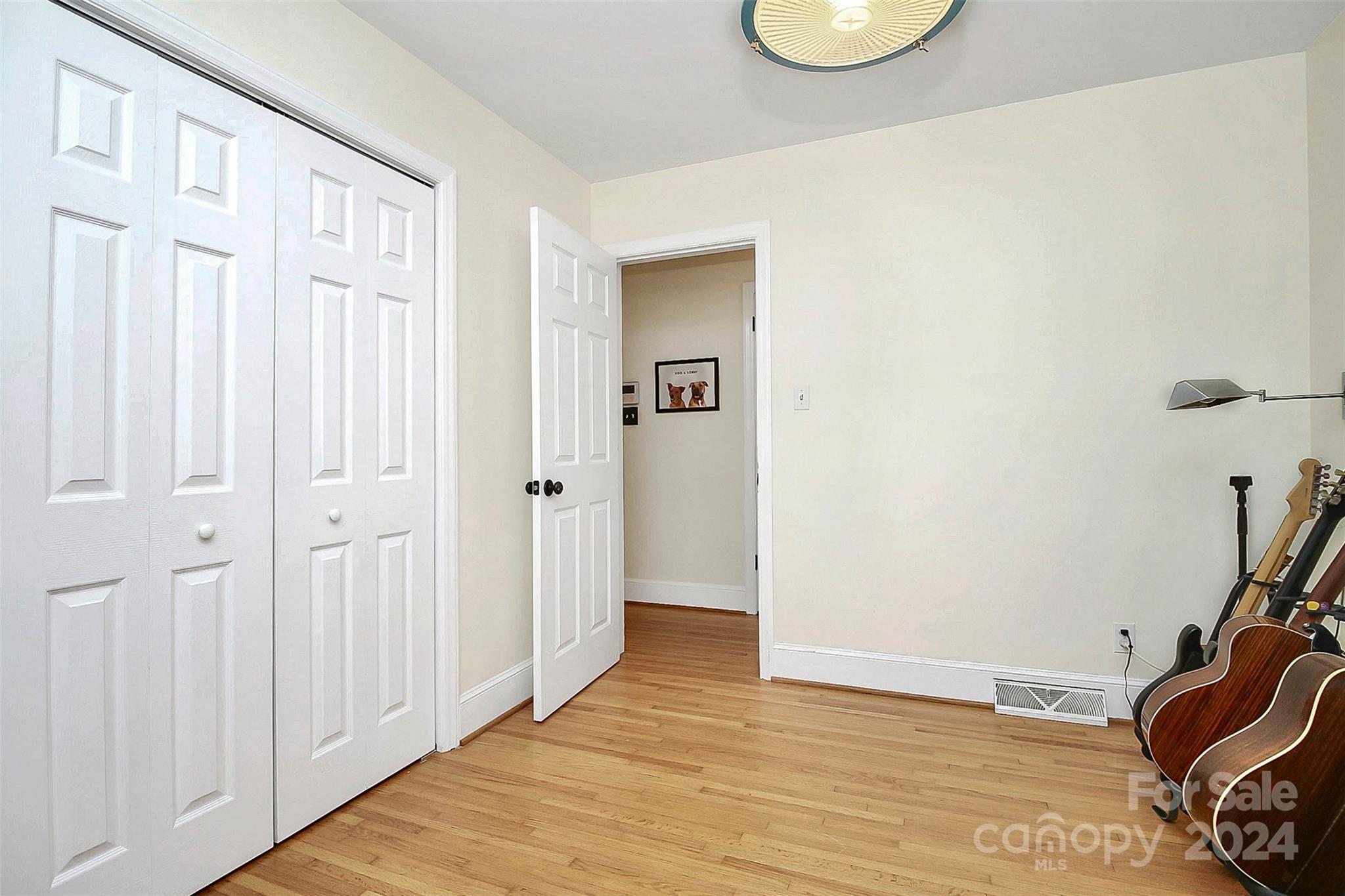 1011 Nancy Drive Charlotte, NC 28211 - Photo 36 of 44 a view of a bedroom with wooden floor