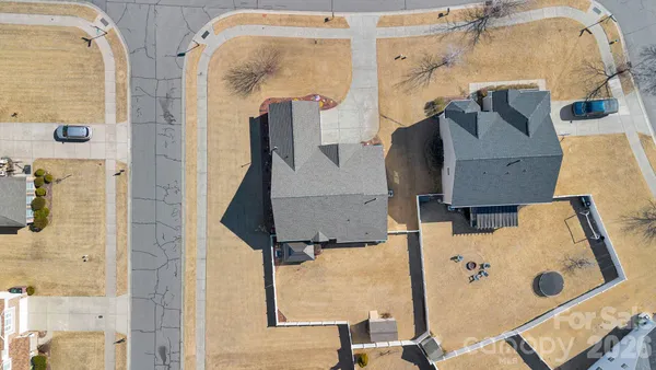 an aerial view of residential house with shower