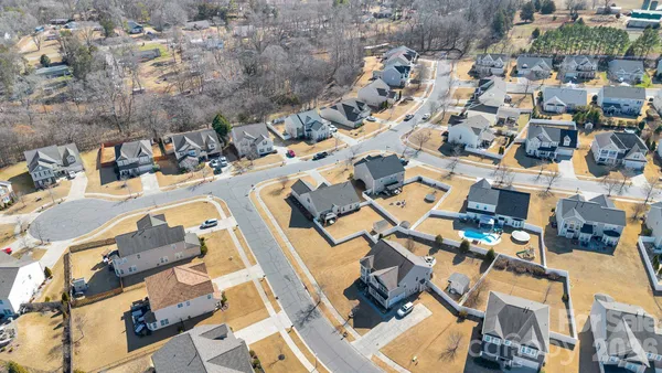 an aerial view of a city with lots of residential buildings