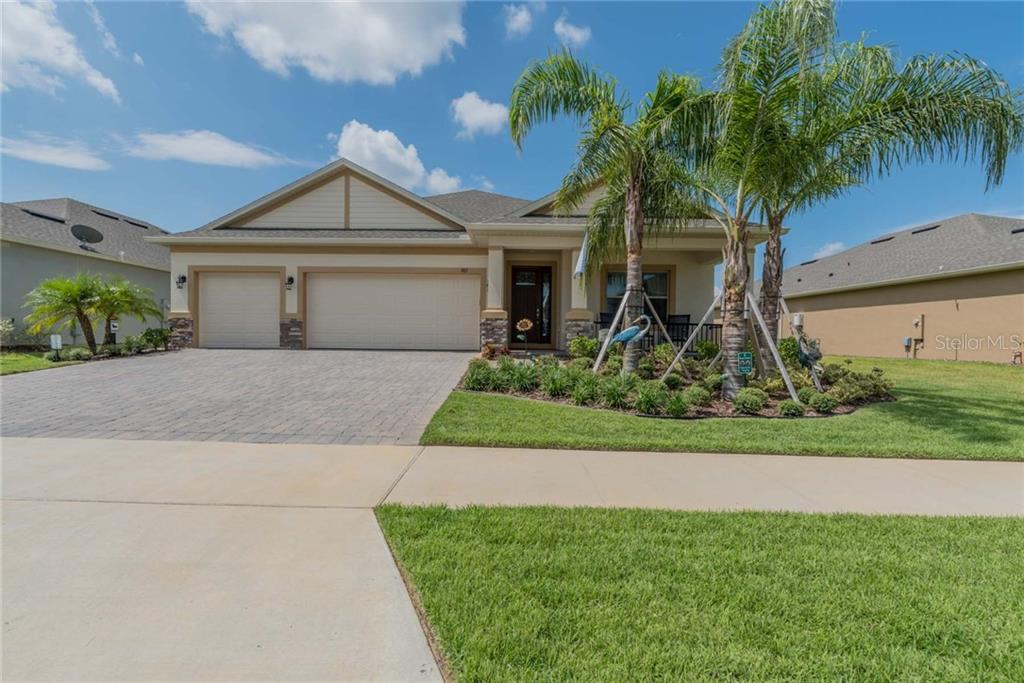 982 Nathan Ridge Road Clermont, FL 34715 - Photo 1 of 1 Front Exterior, Beautifully Landscaped, Paver Front Porch, Paver Driveway, 3 Car Garage