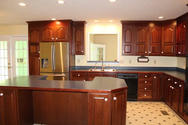 a kitchen with a sink and cabinets