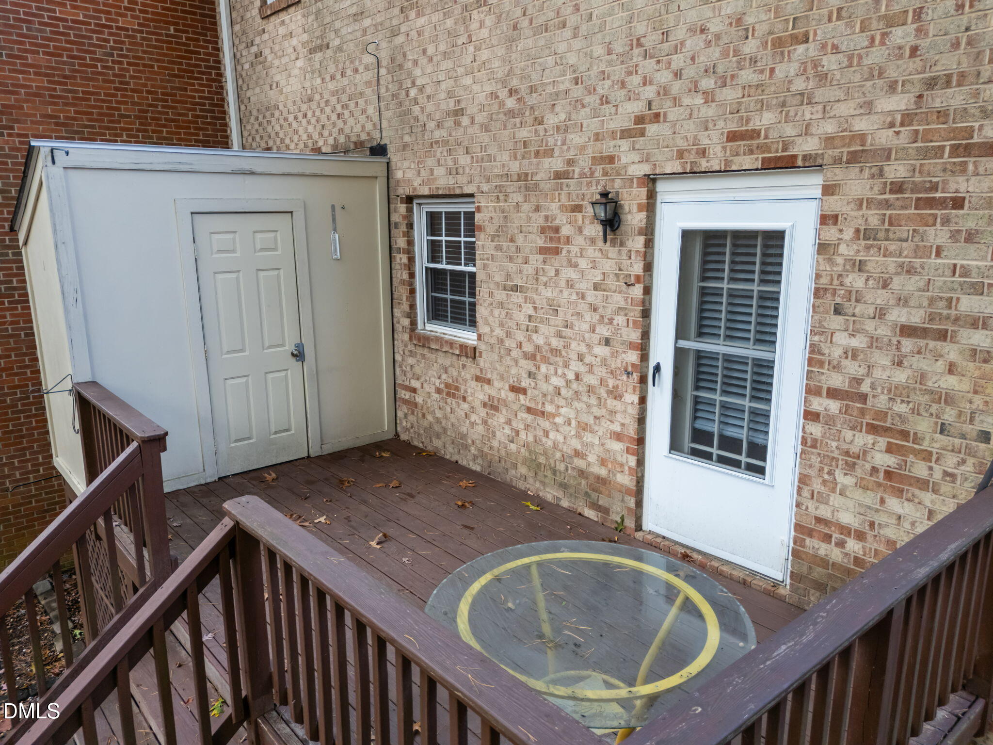 6423 New Market Way Raleigh, NC 27615 - Photo 25 of 33 a view of a house with a wooden deck