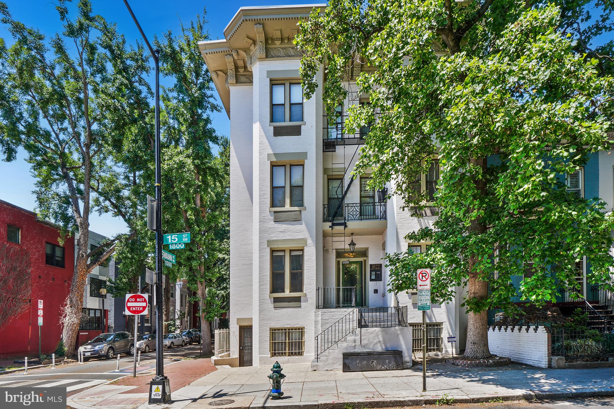 1822 15th Street Northwest, Unit 303 Washington, DC 20009 - Photo 21 of 22 front view of a building with a tree