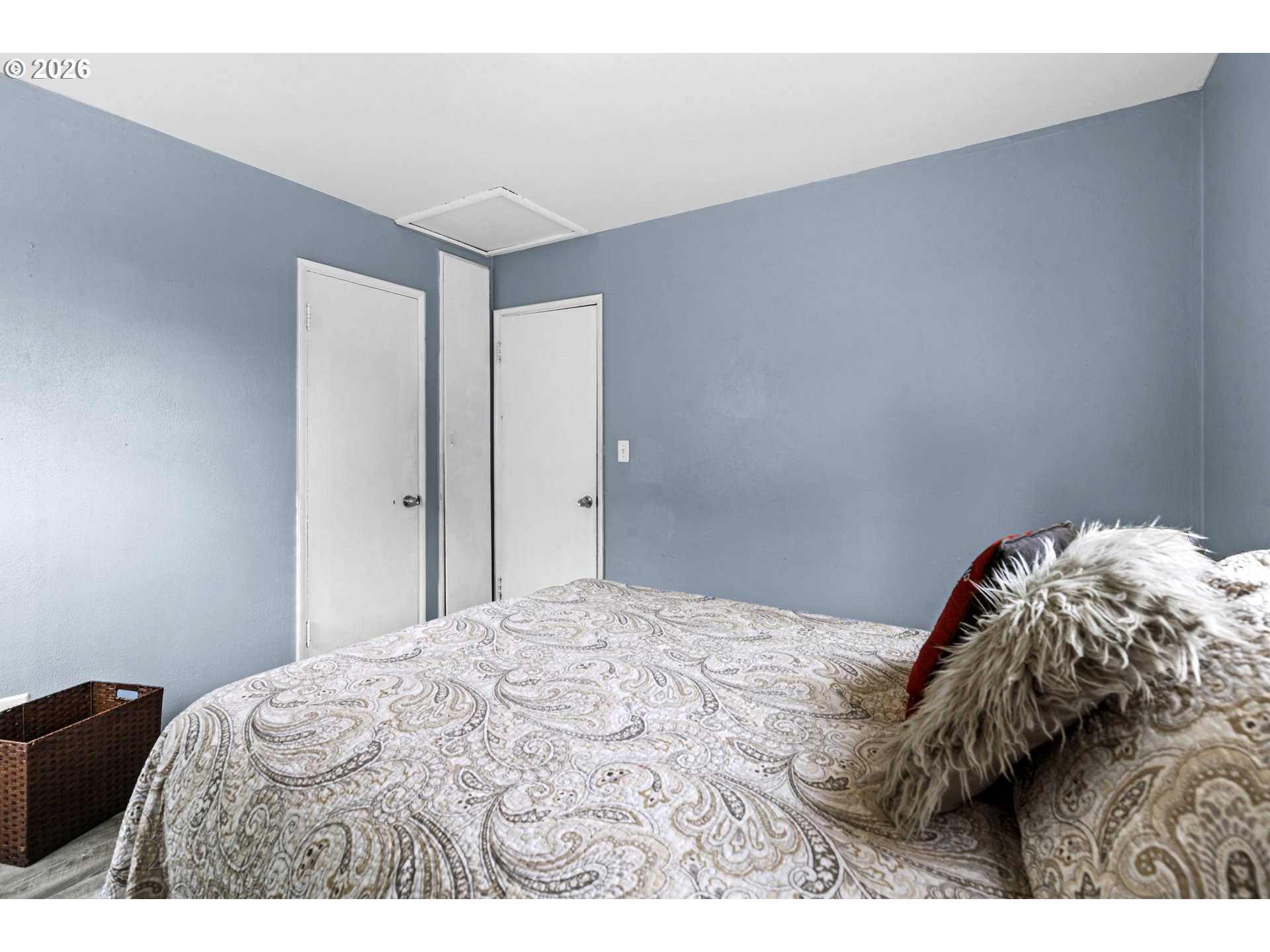 3009 Southwest Isaac Avenue Pendleton, OR 97801 - Photo 20 of 28 a bedroom with a bed and a lamp