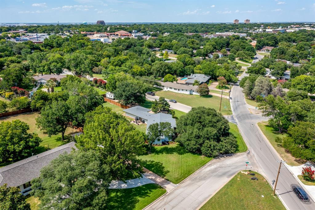 6700 Fortune Road Fort Worth, TX 76116 - Photo 39 of 40 Established residential setting featuring mature trees and paved streets