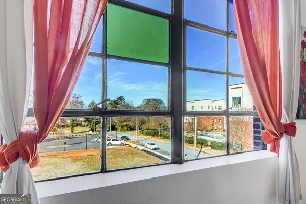 a view of a balcony with an outdoor space