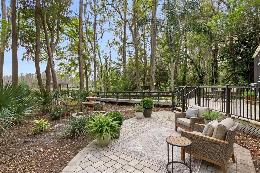 3632 Little Road Lutz, FL 33548 - Photo 15 of 44 a garden view with a seating space