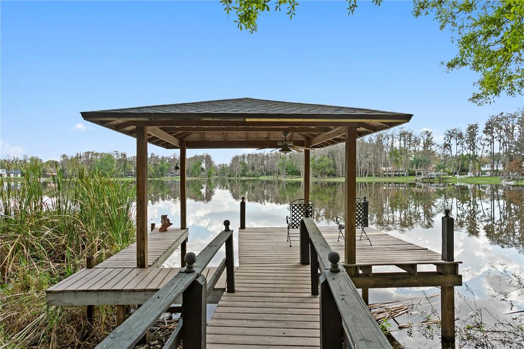 3632 Little Road Lutz, FL 33548 - Photo 18 of 44 a view of a balcony with wooden floor and outdoor space