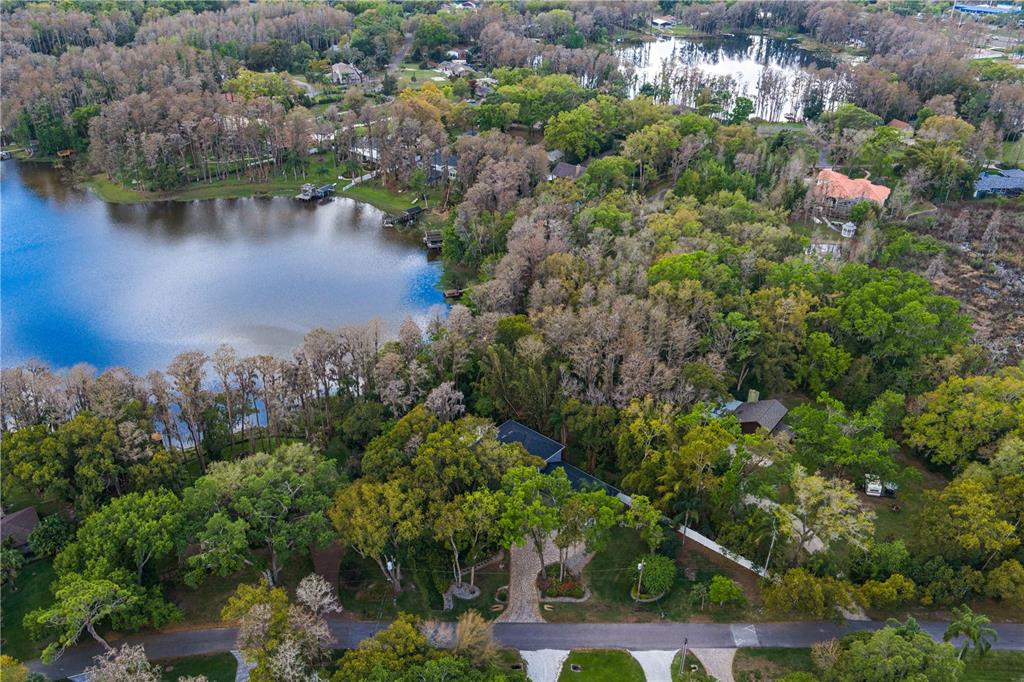 3632 Little Road Lutz, FL 33548 - Photo 40 of 44 an aerial view of a houses with outdoor space and lake view
