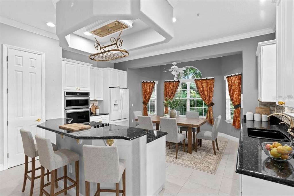 3632 Little Road Lutz, FL 33548 - Photo 6 of 44 a dining room with furniture and window