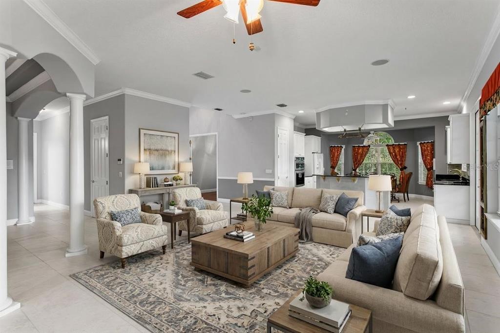 3632 Little Road Lutz, FL 33548 - Photo 9 of 44 a living room with furniture and a large window