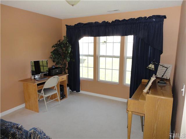 4812 Cardinal Grove Boulevard Raleigh, NC 27616 - Photo 7 of 19 Dining room with double windows and plenty of space for large table