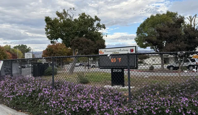 a view of a street with houses