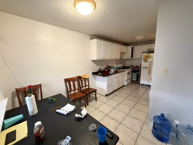 a kitchen with a cabinets and counter space