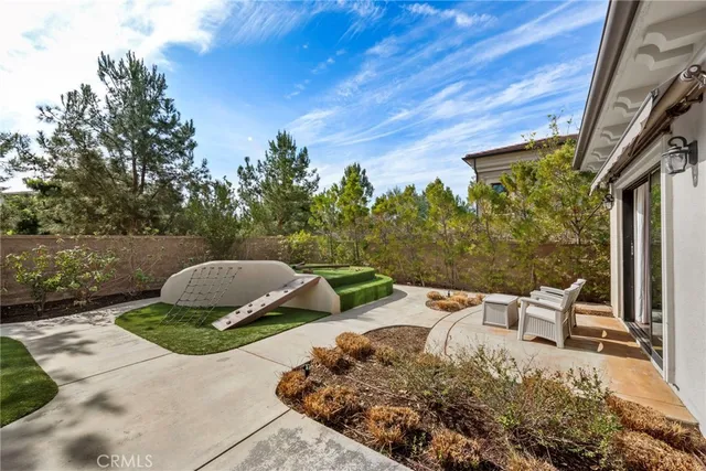 a garden view with a seating space