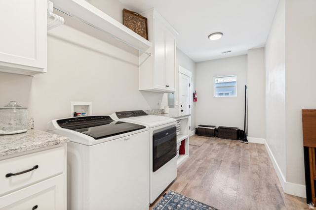332 South 500 West Payson, UT 84651 - Photo 20 of 50 Dedicated laundry area featuring wood style lvp flooring, white cabinetry, granite countertops, and a clothes hanging rod