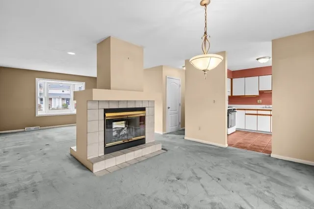 a living room with a fireplace