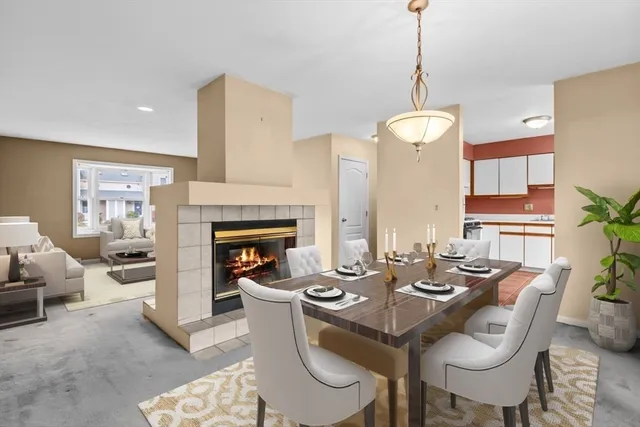 a view of a room with large windows