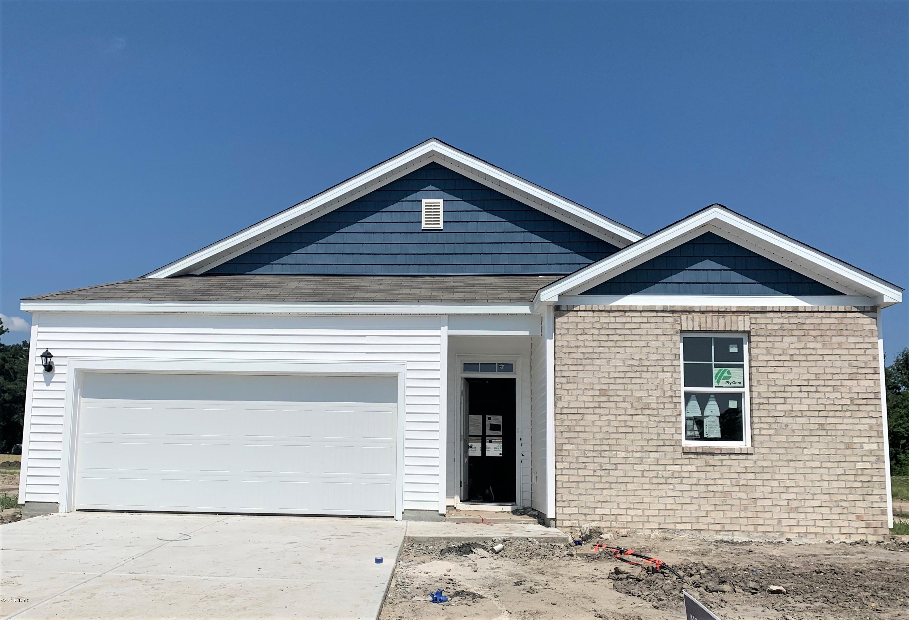 9067 St George Road, Unit LOT 34 Wilmington, NC 28411 - Photo 1 of 57 Colors may vary . The Kerry is one of our best selling plan for a reason! the perfect size 3 bedroom home with a large kitchen island and a covered porch. the owner's suite is large enough for a king bed and room to spare.