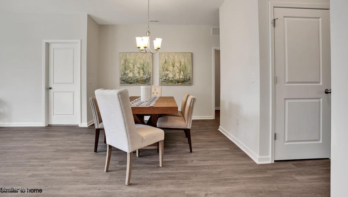 9067 St George Road, Unit LOT 34 Wilmington, NC 28411 - Photo 56 of 57 the Kerry has a large open floor plan with room for a large dining table.