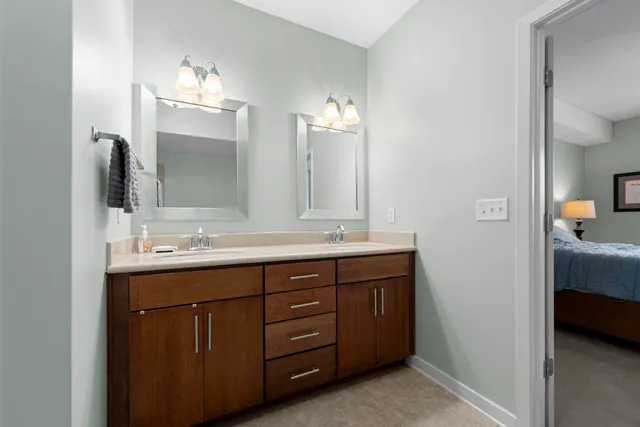 a bedroom with bed and a window