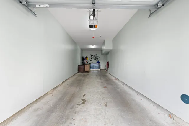 a view of a garden with sitting area