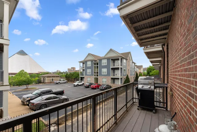 a view of a street with a building in the background